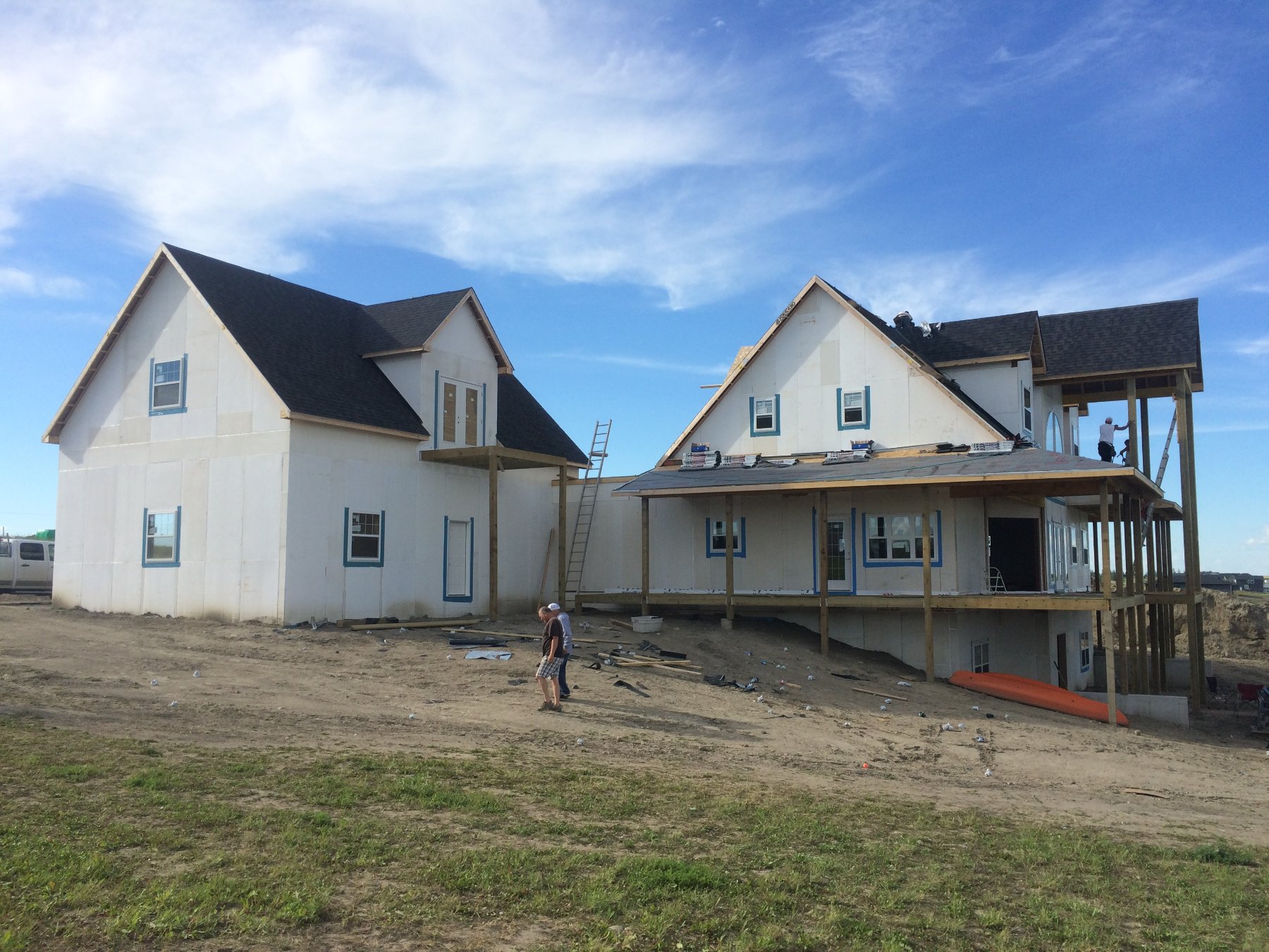 Residential builds, sheathed and drying in