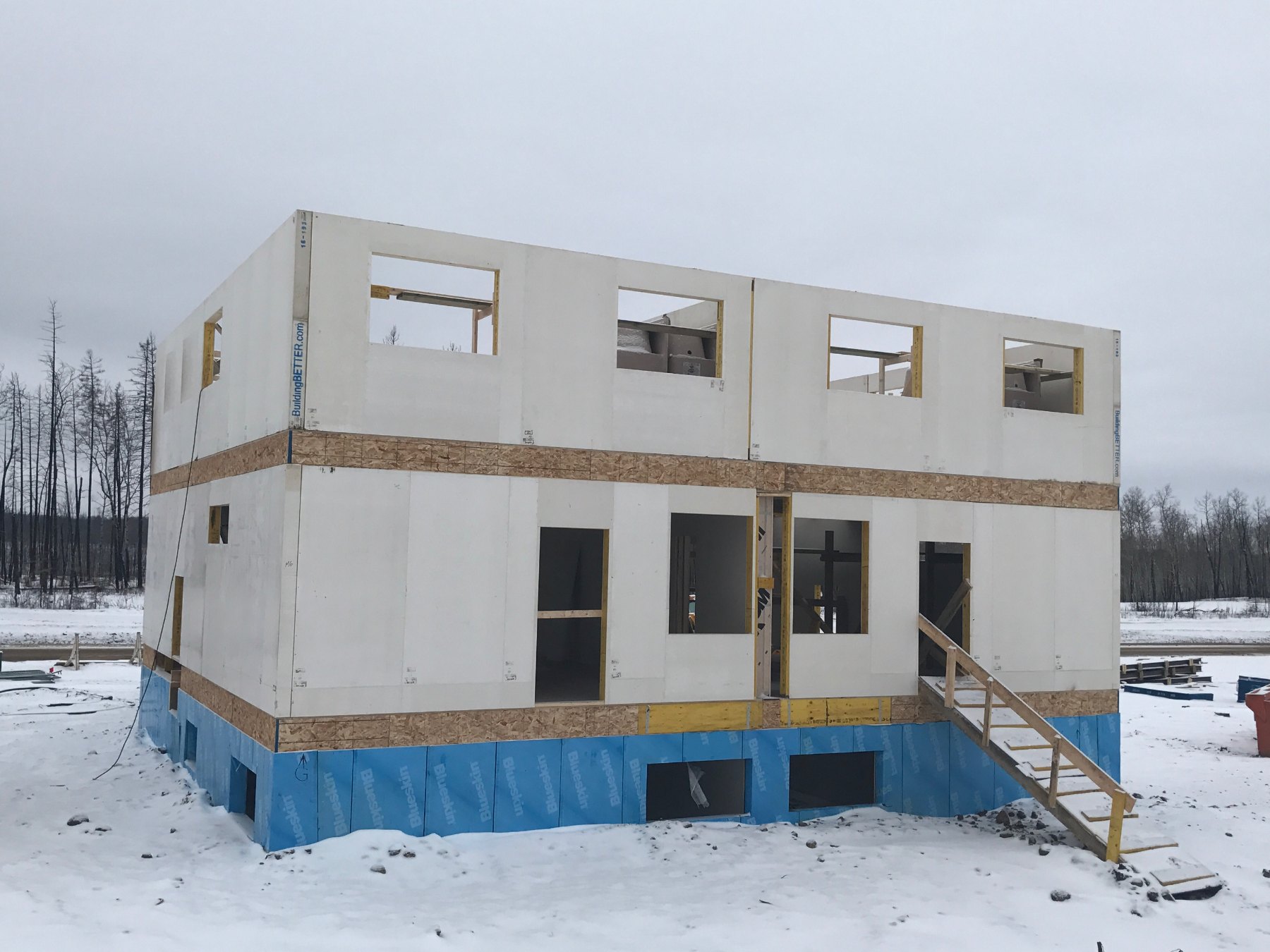 Two-storey panelized build, winter install